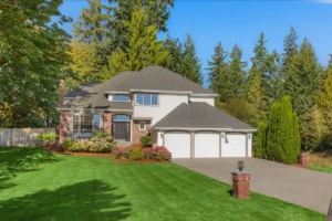 Front exterior of 7229 245th Way NE, a Chaffey home with a three-car garage on a 0.73-acre lot in Redmond’s Elm Tree Lane